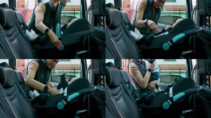 婴儿男孩在汽车座椅内。微笑的母亲打开门，放下把手，解开安全带，小心地将婴儿带出座位。关上门。慢动作