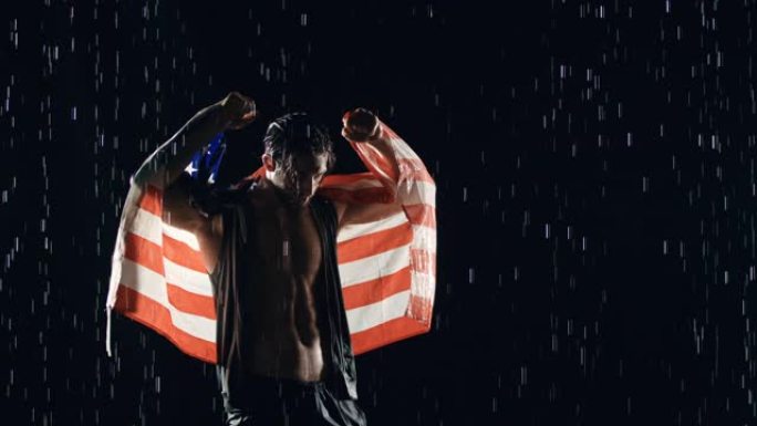 雨中的胜利男子与美国国旗