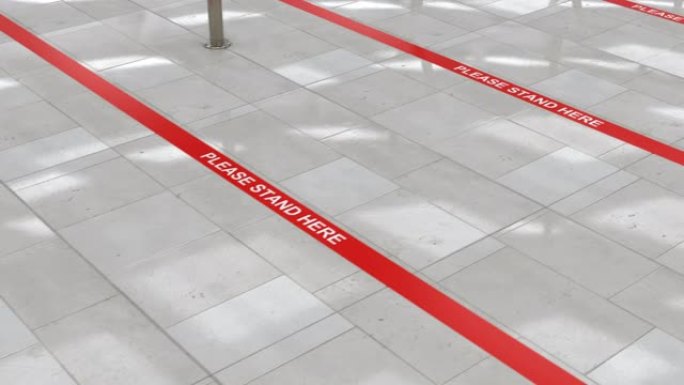 地板上的红色排队线和公共场所的社交距离