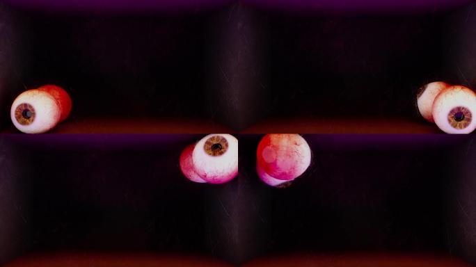 由于重力的变化，撕裂的血腥眼球的3d动画在盒子里滚动。可怕的万圣节眼球。反重力。超自然活动。可怕的梦