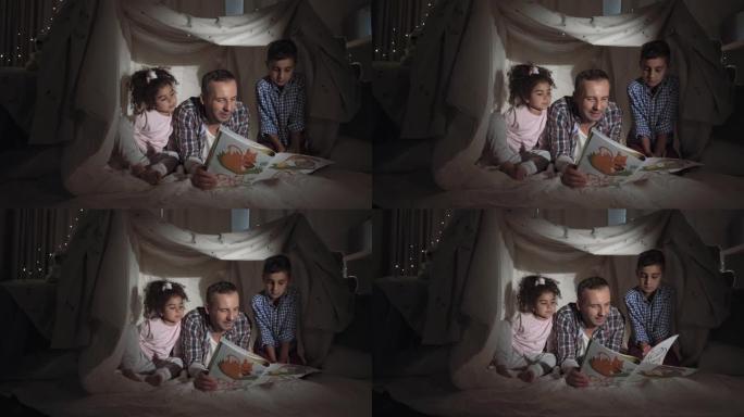 善良的积极父亲和他可爱的小混血孩子正在读书