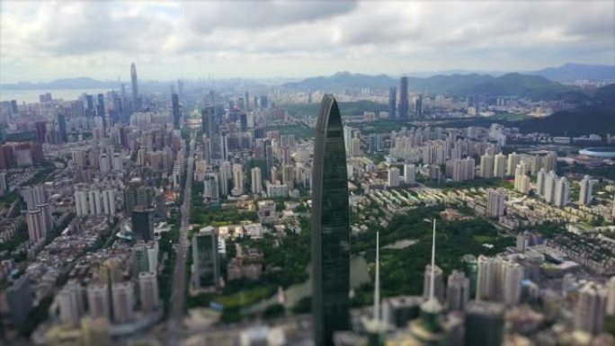 白天深圳城市景观空中全景4k倾斜移动中国