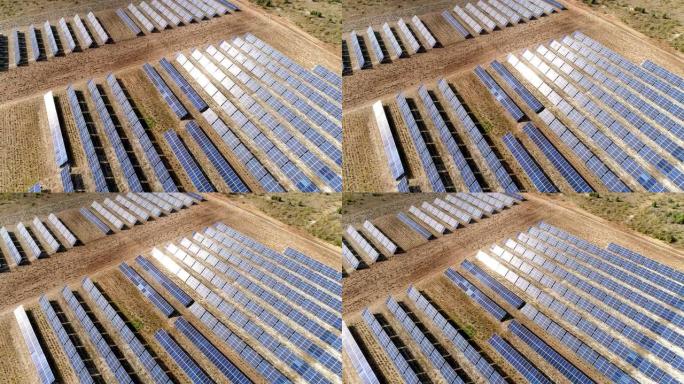 太阳能电池板吸收太阳光线并产生能量的航拍镜头