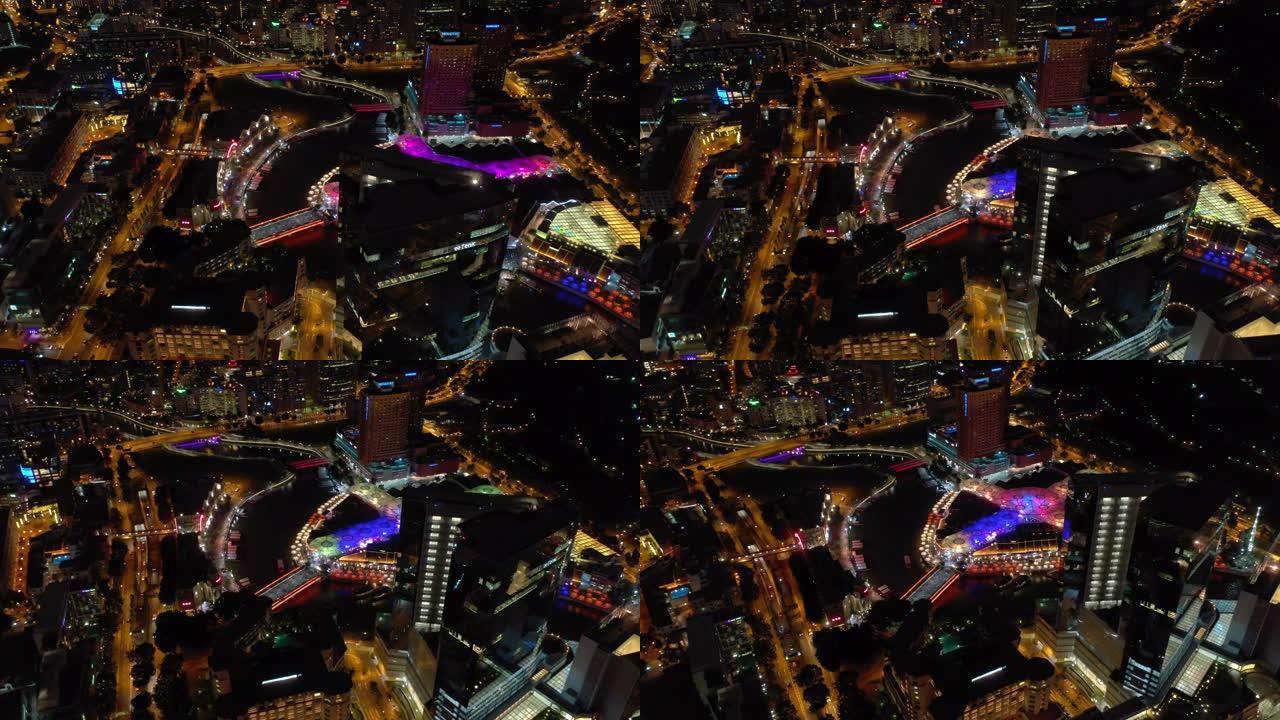 新加坡城市夜间照明著名河滨湾购物中心空中全景4k