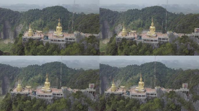 泰国甲米虎穴寺顶佛陀的航拍画面，青石岩，山。