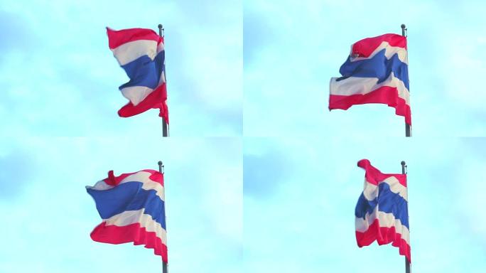 泰国国旗随风挥舞，红色是民族，白色是宗教，蓝色是君主