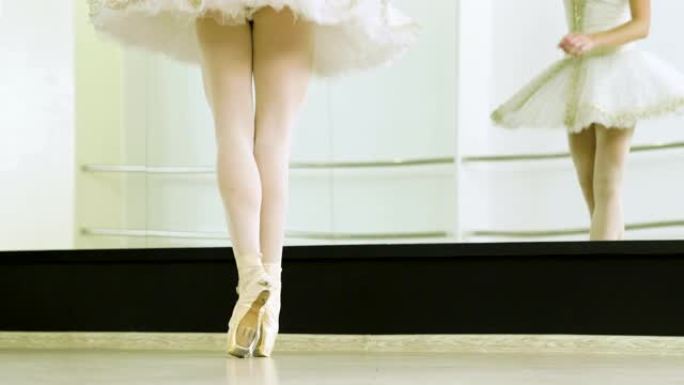 女芭蕾舞演员脚尖着脚尖跳舞的特写镜头。4K