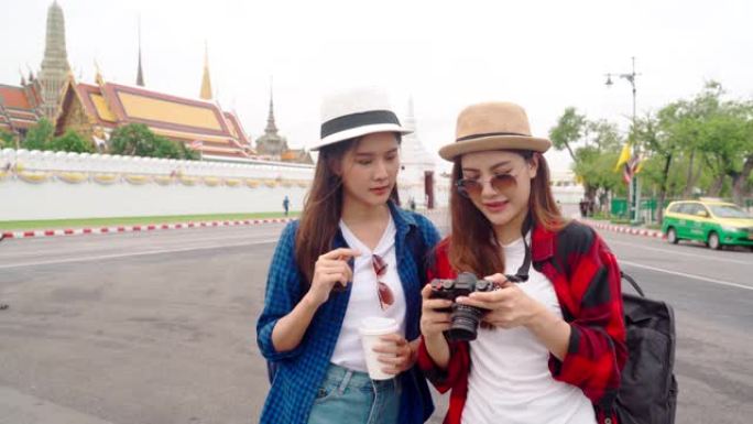 泰国日本同胞的女导游参观该国的主要景点。“Wat Phra Kaeo” 泰国曼谷的地标。亚洲朋友女性