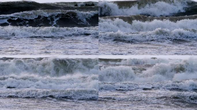 极大的海浪撞击海岸，太平洋美丽的海浪。超级慢动作。风暴期间的海浪。强大的海上热带飓风。全球变暖。恶劣