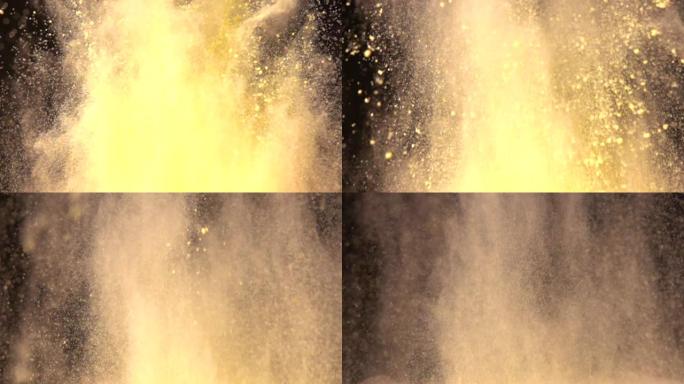 彩色黄色粉末在黑暗孤立背景上的超慢动作爆炸。粉末团向上飞，与烟雾混合。