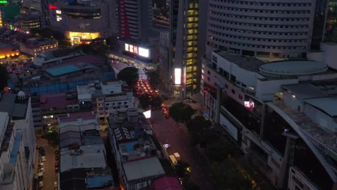 黄昏照明吉隆坡城市交通街十字路口空中全景4k马来西亚
