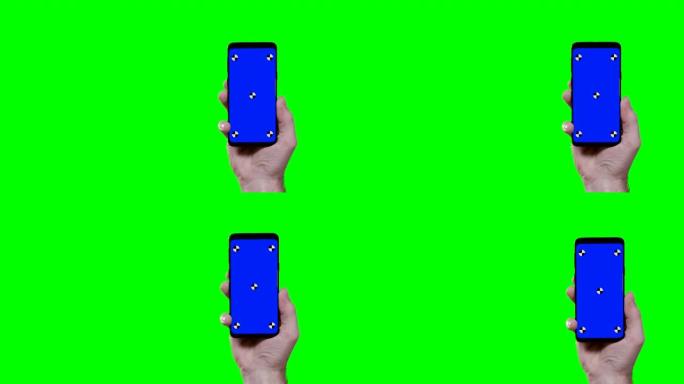 手持蓝色croma关键跟踪点和背景绿色屏幕的智能手机进入屏幕右侧