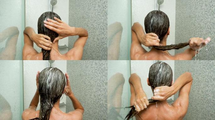 深色头发的女人在洗澡。后面的特写镜头。缓慢的运动。高清