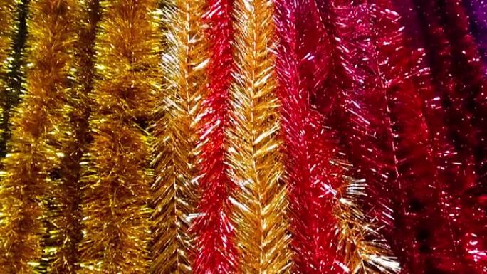 圣诞节，新年背景与五颜六色的金属丝。