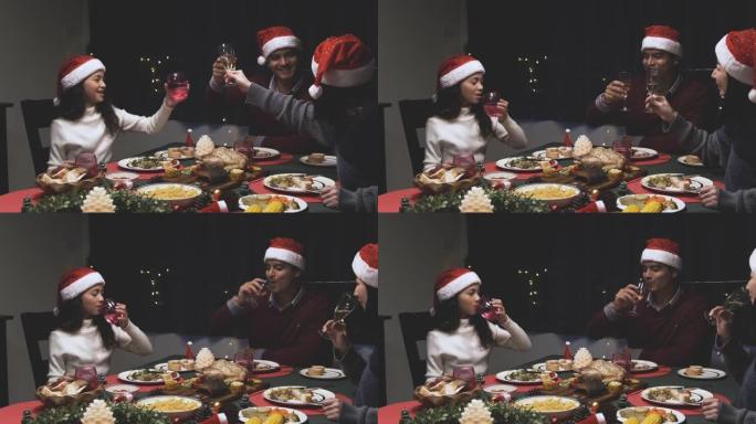 女儿在圣诞节之夜在餐厅与父亲和母亲一起吃晚餐