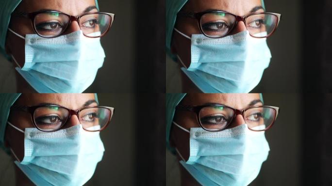年轻的女军医，戴着口罩和眼镜