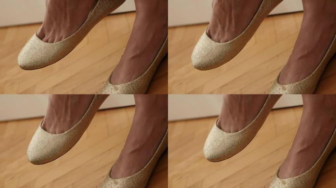 女性腿部金色芭蕾平底鞋4K