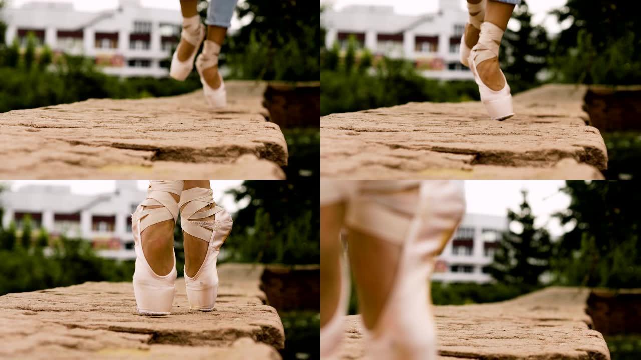 女芭蕾舞演员的脚在街上脚尖着脚尖走路。4K