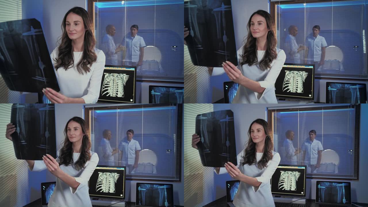 一位年轻美女医生的照片。医生正站在断层扫描室研究x光照片。工作中的专业人士。