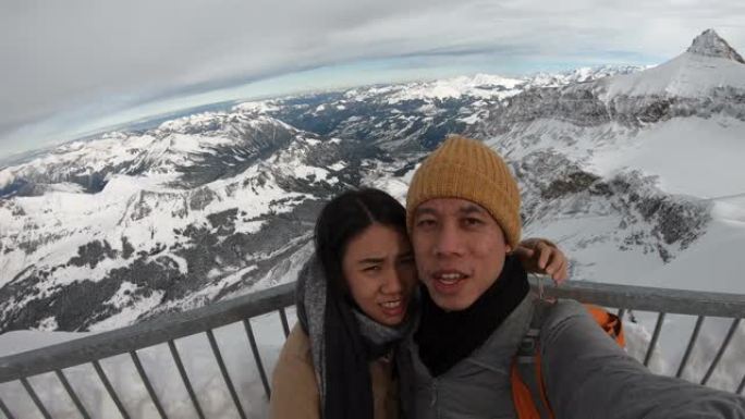 年轻浪漫的情侣一起在瑞士冰川3000旅行