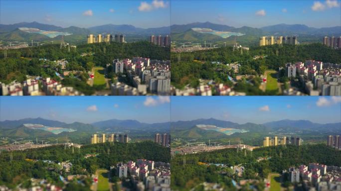 白天深圳城市景观边界空中全景4k倾斜移位中国