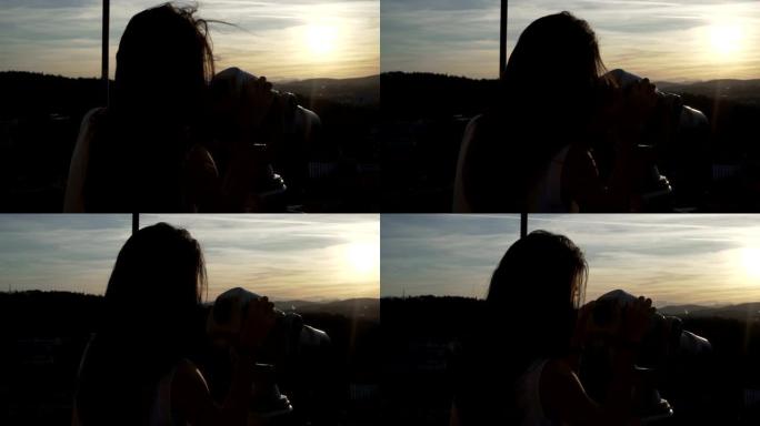 被风吹毛的女孩用双目眼睛看着大特尔诺沃的日落