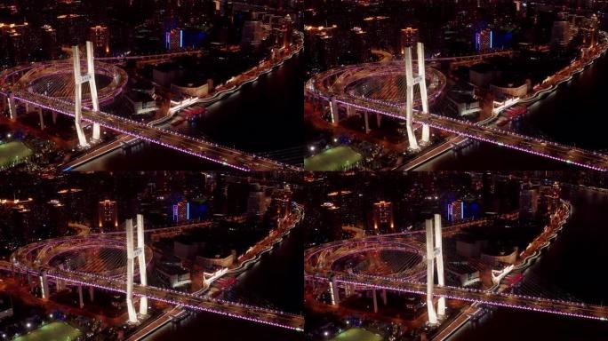 航空视频场景南浦大桥螺旋路夜间日落时间与交通陆上概念，上海，中国4k视频