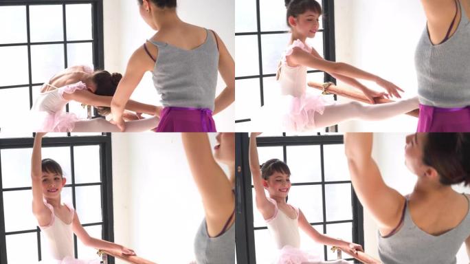 芭蕾舞老师肩膀上的观点调整芭蕾舞课学生的正确姿势
