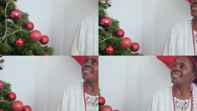 圣诞树旁边的黑人妇女