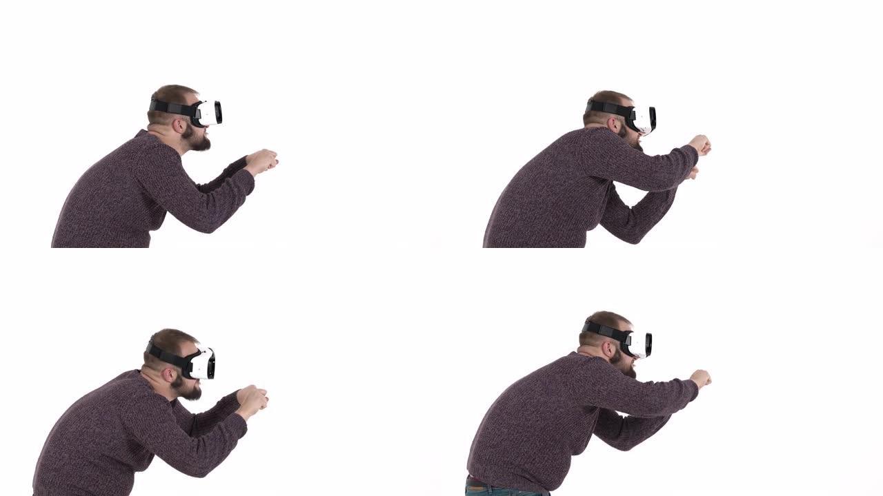 男人模仿虚拟现实眼镜驾驶汽车。酷高科技设备使用概念。