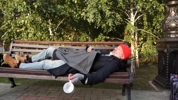 70岁的成熟男人早上留着胡子躺在长凳上