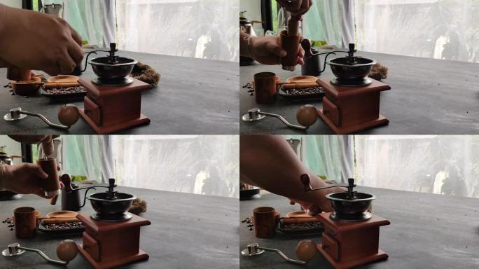 特写烹饪和研磨咖啡滴在桌吧上。