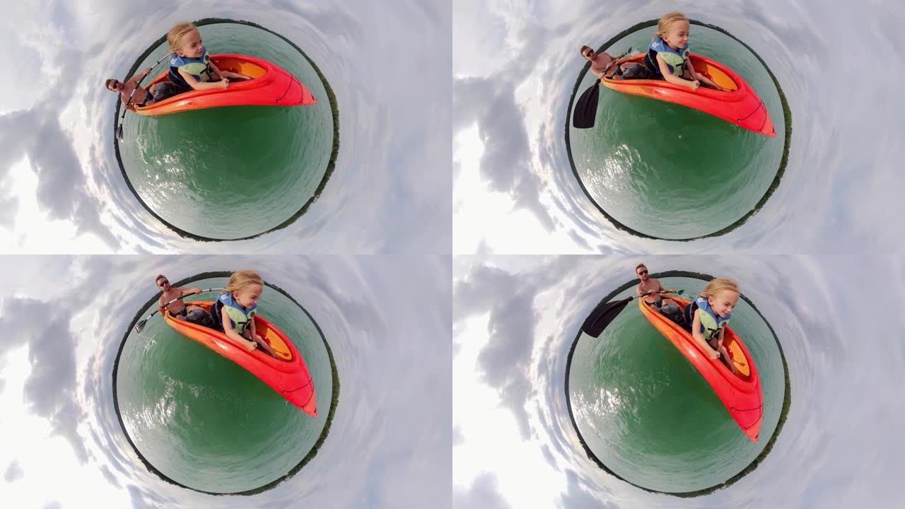 父亲和女儿在绿水湖小行星上划皮划艇