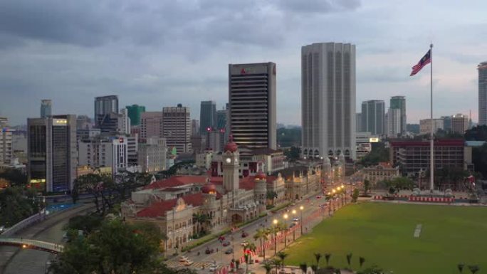 黄昏时间照明吉隆坡城市著名宫殿交通街独立广场空中全景4k马来西亚