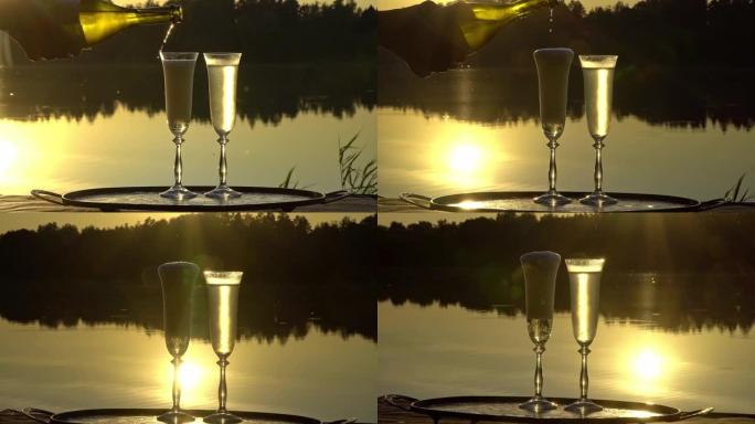 日落时在森林湖上喝两杯香槟