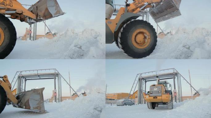 宽热挖掘机铲斗释放北极的积雪