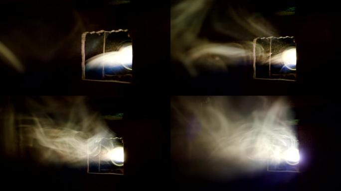 灯光烟雾在投影仪上散布在大厅中
