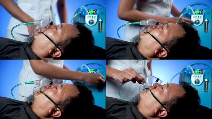 40多岁的亚洲男性正在从冠状病毒中在家中康复。由于呼吸困难，他戴着氧气面罩，并由护士帮助照顾