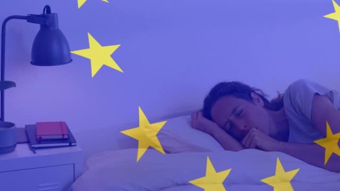 欧盟旗帜飘扬，防止妇女在床上睡觉时咳嗽