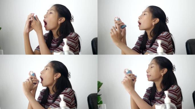 亚洲女孩服用哮喘吸入器有助于在家中呼吸，健康和药物concep