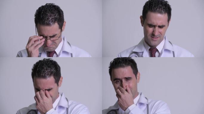 压力大的男人的脸医生看起来悲伤和哭泣