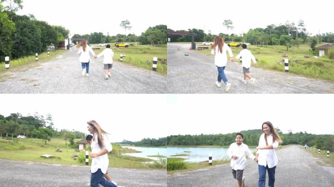 亚洲妈妈和儿子摆姿势，跑步，摄影
