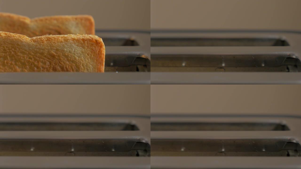烤面包从烤面包机4K弹出
