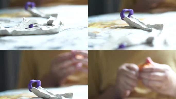 孩子在家玩黏土，生活方式概念。