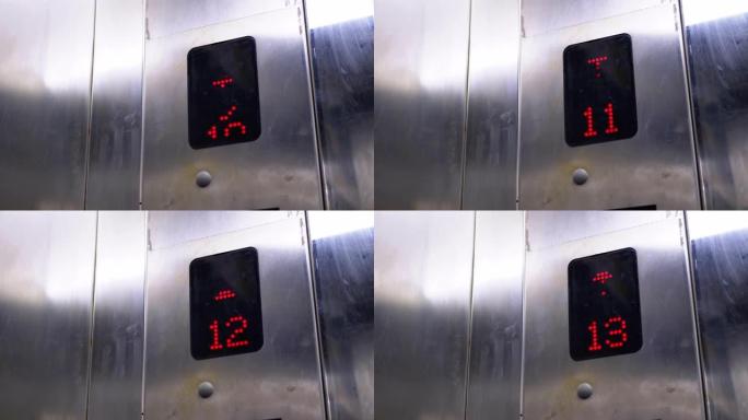 带有箭头向上的电梯中的数字显示显示从8到14的楼层