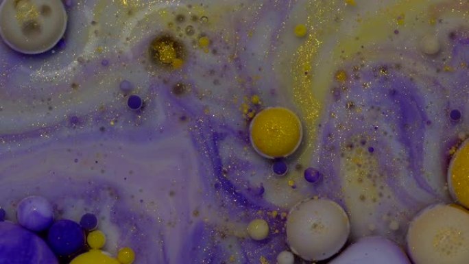 抽象形式。彩色油漆气泡。丙烯酸水滴爆炸并改变形式。运动中的颜色。