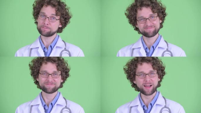 年轻英俊的大胡子卷发医生