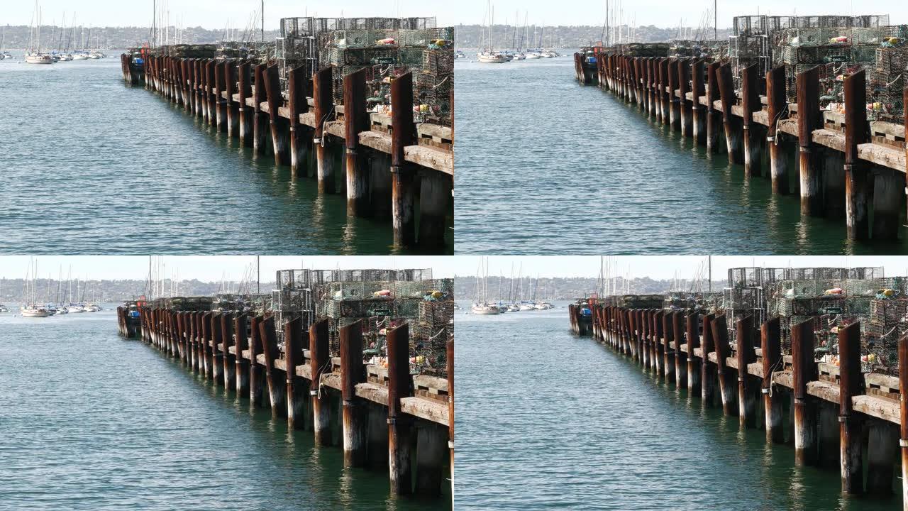 美国加利福尼亚州圣地亚哥港码头、商业码头、渔业上的陷阱、绳索和笼子。在港口捕捞海鲜的空锅和奶油锅。海