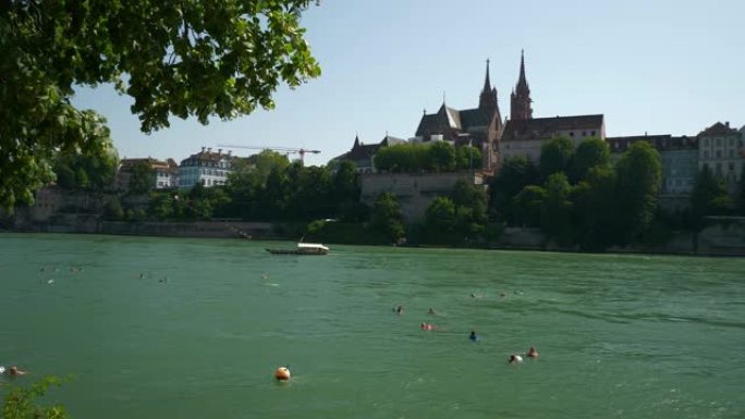 巴塞尔城市河阳光拥挤的游泳区海湾景观著名教堂全景4k瑞士