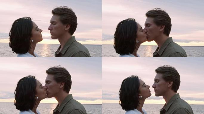 情侣在海洋海岸接吻
